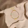 Nuevo brazalete tejido con cuentas estilo sal de nicho con un toque único de alta gama, moderno y elegante, versátil y personalizado