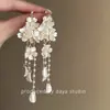 Pendientes de Estilo Festivo con Perlas Dulces de Principios de Primavera Pendientes Largos de Plumas Cuentas de Arroz Borla Geométricos Moda Pendientes de Alta Gama para Mujer