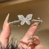 Pulsera Mariposa de Zirconia Electrochapada en Oro Real de Lujo Ligero para Mujer Exquisita Elegante Versátil Nicho Alta Gama Pulsera Abierta