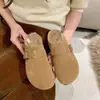 Bestseller de invierno 2026 estilo nuevo Birkenstock cómodos antideslizantes forrados de felpa cálidos zapatos de algodón zapatillas de media caña planas de moda para mujer zapatillas de algodón