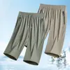 Directo del FabricanteMás Vendidos Shorts Unisex de Seda Helada Genuina Talla Grande, Pantalones Cortos Deportivos Finos de Secado Rápido Rectos para Hombre de Longitud 7/8