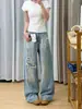 Denim vintage lavado estilo americano con un diseño casual de grafiti salpicado de tinta, con corte de pierna ancha y silueta de pierna recta, una nueva colección de otoño para mujer