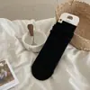 Meias de lã femininas estilo coreano etiqueta de tecido com coraçãozinho meias de cano médio padrão de onda escura simples meias folgadas meias longas sem costura