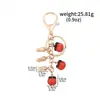 Llavero de cereza transfronterizo, llavero de coche exquisito, accesorio colgante de moda multicolor para bolso de mujer