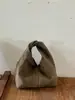 Bolsa de Mão Plissada Grande Capacidade Estilo Francês em Camurça Nova Moda Versátil Outono 2026 Transfronteiriça para Mulheres
