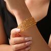 Diseño de personalidad retro bohemio pulsera de cuentas de línea abierta acero de titanio chapado en oro de 18k joyería simple al por mayor