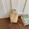 Bolsa Pequeña Manual Simple de Verano para Mujer 2026 Nueva Versátil Bolso para Teléfono de Cuero Suave Bolso Cubo Tacto de Alta Gama Bolso Cruzado