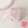 Bolsa de cosméticos con estampado de tulipanes estilo coreano, una bolsa de viaje multifuncional, una bolsa con cordón para guardar toallas sanitarias y un estuche para papelería/lápices