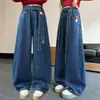 Jeans de otoño para niñas transfronterizos 2026 nuevo estilo ropa exterior de otoño para niños pantalones rectos de pierna ancha holgados para niños mayores modernos