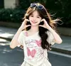 Conjunto de Verano para Niñas 2026 Camiseta de un Hombro para Niños Falda de Pastel Conjunto de Dos Piezas Ropa Infantil Huzhou Zhili Dropshipping