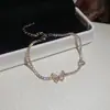 Pulsera de Broche Flor de Circonita Chapada en Oro Real, Lujo Ligero, Sensación de Alta Gama, Pulsera Elegante con un Diseño Único, Joyería Exquisita de Nicho