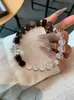 Pulsera minimalista de cuentas de madera de ébano en tonos fríos con cuentas cuadradas de madera combinadas con cuentas facetadas de cristal blanco transparente en un nuevo estilo chino