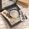 Pulseira de Corda Tecida à Mão com Pingente de Donut Imitação de Jade Hetian Marca Fu Ano do Buming Pulseira de Casal para Mulheres
