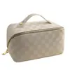Bolsa de Maquillaje Personalizada de Cuero PU a Cuadros Transfronteriza Bolsa de Almacenamiento de Gran Capacidad Portátil a Mano Bolsa de Tocador Portátil para Viajes