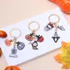 Colgantes de llavero de Halloween transfronterizos europeos y americanos fantasma calavera calabaza parca aleación bolsa de aceite goteo accesorios al por mayor