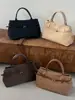 Bolso tote texturizado transfronterizo para el día a día 2026 nuevo vintage simple de mano moderno versátil de gran capacidad para mujer