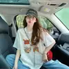 Camiseta de Manga Curta Estilo Retro Cartoon Graffiti Feminina Design com Senso Renda Jacquard Semi-transparente Solta Emagrecimento Top Tendência