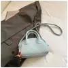 Bolsa de Boliche Portátil Fashion e Sofisticada para Mulheres Nova Coleção Primavera 2026 Bolsa Quadrada Pequena Retro Bolsa Transversal de Ombro