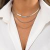 Collar de clavícula hueca apilada versátil de joyería transfronteriza europea y americana, collar de cadena de hueso de serpiente de metal retro personalizado de múltiples capas