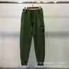 Calça de Moletom Funcional Casual Esportiva com Bolso com Zíper, Distintivo de Bússola de Pedra Europeia e Americana Transfronteiriça, Calça de Malha para Homens e Mulheres