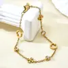 Estilo Europeu e Americano Trevo de Quatro Folhas Cravejado com Diamantes Aço Inoxidável Banhado a Ouro 18K Pulseira de Luxo de Nicho High-End para Mulheres Versátil Atacado