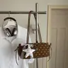 Versión coreana 2026 nueva bolsa sencilla para el día a día, bolso de hombro elegante y atractivo, bolso lindo para debajo del brazo estilo coreano, bolso estilo ins
