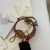Bolso Versátil de Moda de Alta Gama Transfronterizo para Mujer Modelo Nuevo 2025 Bolso Redondo Pequeño Sencillo de Nicho Popular Bolso de Hombro Exquisito