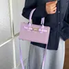 Bolso de mano de lujo ligero estilo coreano al por mayor para mujer, nuevo modelo de verano 2026, bolso de hombro texturizado de color liso, bolso cruzado para el día a día