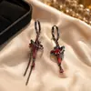 Pendientes de estilo punk oscuro gótico retro transfronterizos, pendientes de borla rojos dulces y geniales de chica hot, pendientes de la serie de Halloween