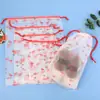 Bolsa con cordón transfronteriza de plástico translúcido esmerilado con oso de dibujos animados, bolsa de almacenamiento, bolsa de embalaje para ropa de viaje