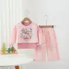 Traje Casual de Primavera para Niñas 2026 Nuevo Conjunto de Tres Piezas con Sudadera con Capucha de Dibujos Animados, Chaleco y Pantalones Cargo de Pierna Ancha