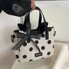 Bolso de mano de gran capacidad para el hombro y la axila, moda de verano 2026, transfronterizo, bolso tipo cubo simple de gran capacidad para el día a día