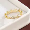 Anel Cruzado de Zircônia de Quatro Garras Anel Personalizado Quadrado Irregular com Banda Pavimentada de Zircônia Joia