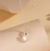 Foto real de Tiqia del Collar Mariposa de la Fortuna para mujer, plata de ley S925, nuevo estilo chino, lujo ligero, elegante colgante de calabaza de calcedonia blanca