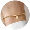 Pulsera Nueva de Estilo Europeo y Americano con Perlas Doradas de 26 Letras para Mujer, Pulsera con Colgante de Disco Redondo, Pulsera Elástica de Hilo con Perlas de Cobre