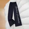 Pantalones deportivos casuales de pierna recta con estampado de letras estilo americano, nuevos pantalones para mujer con cordón, pantalones de pierna ancha, corte holgado, versátiles y que estilizan, pantalones largos