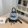 Mochila linda de lunares transfronteriza para mujer, nuevo modelo de verano 2026, alto atractivo estético, mochila pequeña moderna y de moda con lazo