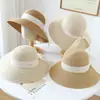 Sombrero de paja de verano para mujer con lazo, protección solar, adecuado para viajes, sombrero de pescador, sombrero de cubo 03