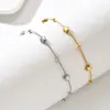 Pulsera de Cadena Fina con Flor de Cuatro Hojas Personalizada de Acero Inoxidable Estilo Europeo y Americano, Doble Color Oro y Acero, Exquisita Joyería de Nicho para Mujer