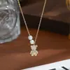 Novo Estilo Primavera e Verão Banhado a Ouro Real Zircônia Micro-Incustada Corrente de Clavícula Personalizada para Mulheres, Colar de Urso Pedra Olho de Gato de Alta Qualidade Atacado