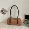 Bolso de diseño único para mujer para el trabajo diario, nuevo modelo de verano 2026, bolso de mano tipo bowling, alto valor estético, bolso de hombro color block