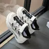 Zapatos Infantiles Primavera y Verano 2026 Estilo Nuevo Niños Casuales Suela Suave Malla Transpirable Huecos Zapatos para Correr Niñas Zapatos de Papá