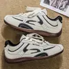 Tênis Casuais Respiráveis Moda Color-Block Nova Cor Primavera 2026 Leves Retrô Tendência de Treino Alemã Versáteis com Cadarço Sapatos Masculinos