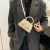 Bolso Pequeño Cuadrado Mini Portátil de Alta Calidad para Mujer 2024 Nuevo Bolso de Hombro de Moda Bolso Transmisor de Comercio Exterior Transfronterizo