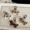 Chaveiro de Pelúcia Fofo Estilo Japonês Desenho Animado Cachorro Dachshund Chaveiro de Pelúcia Fofo Pingente Venda por Atacado