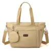 Bolsa de Lona Bolsa de Ombro Feminina Nova 2025 Bolsa de Mão em Tecido Oxford de Nylon Bolsa Transversal Casual para o Trabalho