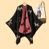 Chal de estilo coreano para mujer, patrón de dibujos animados simple, con abertura, otoño e invierno, engrosado, cálido, capa tipo cárdigan de jacquard, venta caliente transfronteriza, nuevo