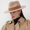 Estilo francés nuevo otoño e invierno sombrero plano de lana para hombres y mujeres moderno ala ancha negro todo a juego Europeo y Americano circunferencia de cabeza grande camel