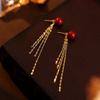 Bajo el árbol baniano S925 plata nuevos aretes de borla de cinabrio chino para mujer aretes de temperamento de alto sentido de dos usos nueva moda