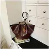 Bolsa de Ombro Simples Nova de Verão 2026 Bolsa Fashion para o Dia a Dia Bolsa de Axila Feminina Bolsa Tote Vintage de Grande Capacidade para Mulheres